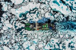 Drone shot of icebreaker in a sea of ice